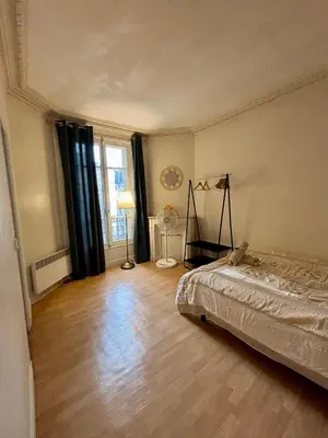 Un ou plusieurs lits dans un hébergement de l'établissement Appartement Convention Fourcade