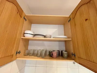 Cuisine ou kitchenette dans l'établissement Appartement Convention Fourcade