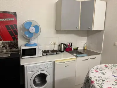 Cuisine ou kitchenette dans l'établissement Bien venu au studio B