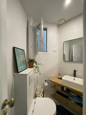 Salle de bains dans l'établissement Cozy 2-room Haussmann Apartment - Buttes Chaumont