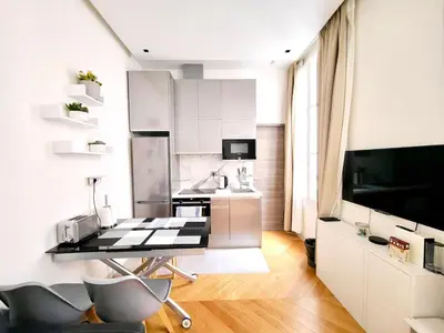 Cuisine ou kitchenette dans l'établissement Appartement moderne et rénové au coeur de Paris