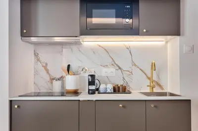 Cuisine ou kitchenette dans l'établissement SUPER CENTRAL - Montorgueil - Designer Studio