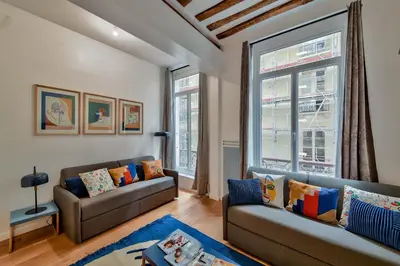 Coin salon dans l'établissement Urban Flat 98 - 4 Bedrooms Apartment center of Paris