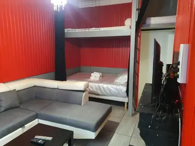 Un ou plusieurs lits dans un hébergement de l'établissement Clichy Loft