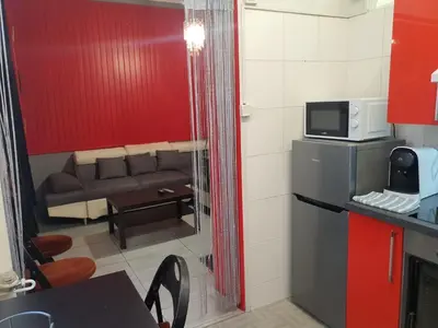 Cuisine ou kitchenette dans l'établissement Clichy Loft