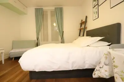 Un ou plusieurs lits dans un hébergement de l'établissement Paris Luxury Studio