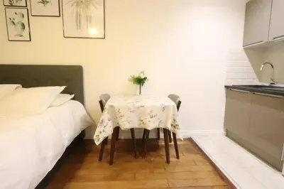 Un ou plusieurs lits dans un hébergement de l'établissement Paris Luxury Studio