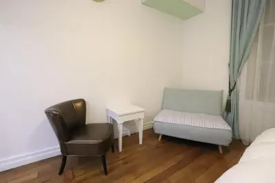 Un ou plusieurs lits dans un hébergement de l'établissement Paris Luxury Studio