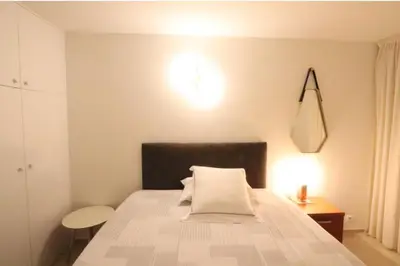 Un ou plusieurs lits dans un hébergement de l'établissement Chambre proche Montmartre