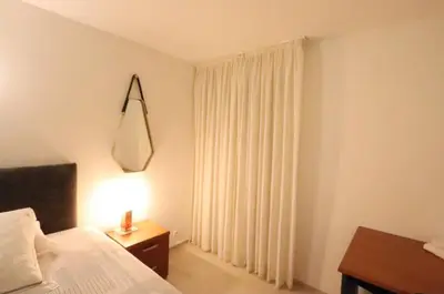 Un ou plusieurs lits dans un hébergement de l'établissement Chambre proche Montmartre