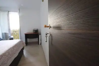 Un ou plusieurs lits dans un hébergement de l'établissement Chambre proche Montmartre