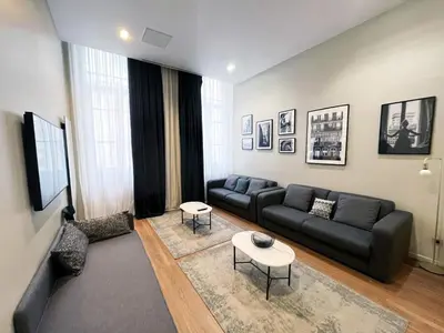 Coin salon dans l'établissement UrbanFlat 91 - Beautiful Apartment in Le Marais