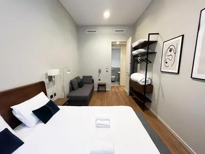 Un ou plusieurs lits dans un hébergement de l'établissement UrbanFlat 91 - Beautiful Apartment in Le Marais