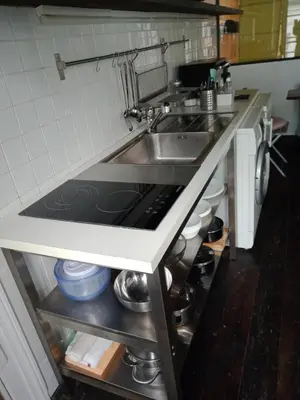 Cuisine ou kitchenette dans l'établissement Le Marais St-Paul bail mobilité