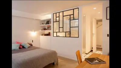 Un ou plusieurs lits dans un hébergement de l'établissement Unique House in the 16