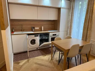 Cuisine ou kitchenette dans l'établissement Élégant appartement Paris 17