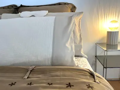 Un ou plusieurs lits dans un hébergement de l'établissement Loft Montmartre