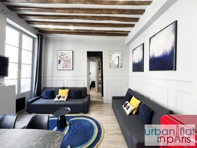 Coin salon dans l'établissement UrbanFlat 44 - Apartment in center of Paris