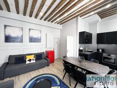 Télévision ou salle de divertissement dans l'établissement UrbanFlat 44 - Apartment in center of Paris