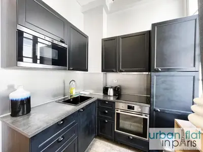 Cuisine ou kitchenette dans l'établissement UrbanFlat 44 - Apartment in center of Paris