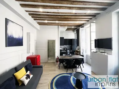 Télévision ou salle de divertissement dans l'établissement UrbanFlat 44 - Apartment in center of Paris