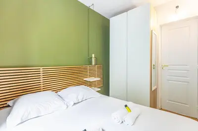 Un ou plusieurs lits dans un hébergement de l'établissement GuestReady - Elegant stay near Sacré-Cœur