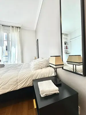 Un ou plusieurs lits dans un hébergement de l'établissement Appartement City Arc de Triomphe