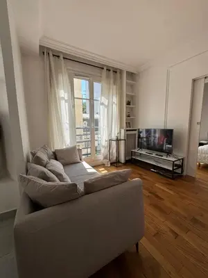 Télévision ou salle de divertissement dans l'établissement Appartement City Arc de Triomphe