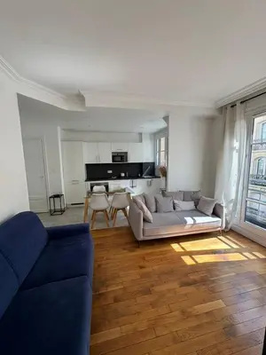 Coin salon dans l'établissement Appartement City Arc de Triomphe
