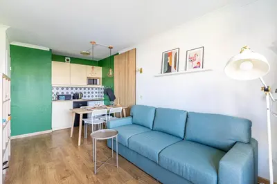 Cuisine ou kitchenette dans l'établissement GuestReady - Sunny apartment with balcony views