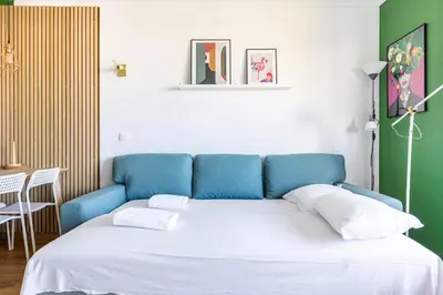 Un ou plusieurs lits dans un hébergement de l'établissement GuestReady - Sunny apartment with balcony views