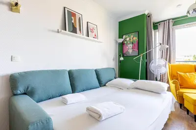 Un ou plusieurs lits dans un hébergement de l'établissement GuestReady - Sunny apartment with balcony views