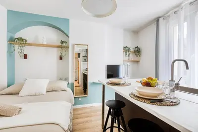 Un ou plusieurs lits dans un hébergement de l'établissement Suite design Batignolles Lignes 13 & 14