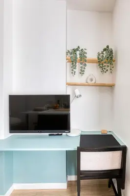 Coin salon dans l'établissement Suite design Batignolles Lignes 13 & 14