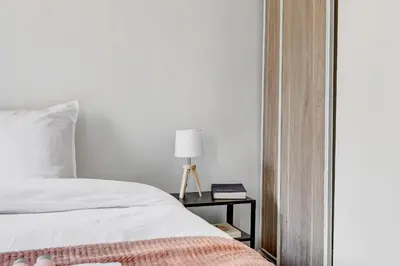 Un ou plusieurs lits dans un hébergement de l'établissement Suite Elise - Superbe Appartement à Paris