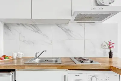 Cuisine ou kitchenette dans l'établissement Suite Elise - Superbe Appartement à Paris