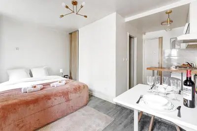 Un ou plusieurs lits dans un hébergement de l'établissement Suite Elise - Superbe Appartement à Paris