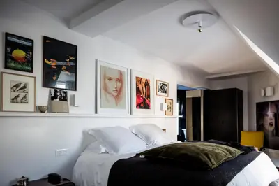 Un ou plusieurs lits dans un hébergement de l'établissement Le Pigalle, a Member of Design Hotels