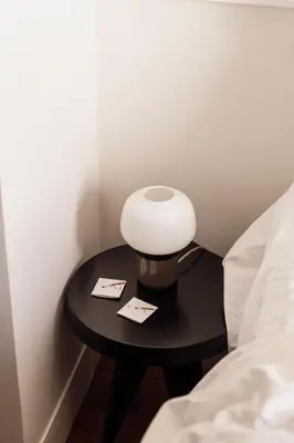 Un ou plusieurs lits dans un hébergement de l'établissement Le Pigalle, a Member of Design Hotels