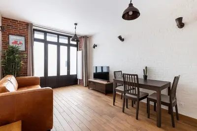 Coin salon dans l'établissement Practical Flat, Paris X