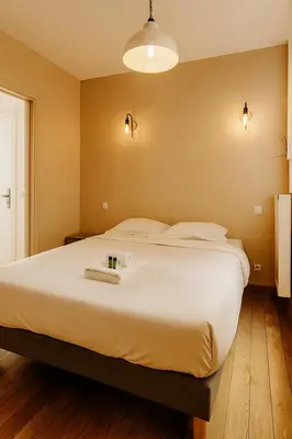 Un ou plusieurs lits dans un hébergement de l'établissement Practical Flat, Paris X