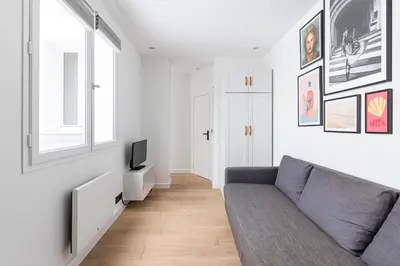 Télévision ou salle de divertissement dans l'établissement Comfy Flat, Montparnasse