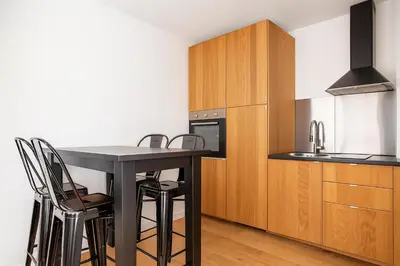 Cuisine ou kitchenette dans l'établissement Comfy Flat, Montparnasse