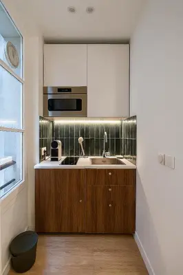 Cuisine ou kitchenette dans l'établissement Nice Studio Place Gambetta