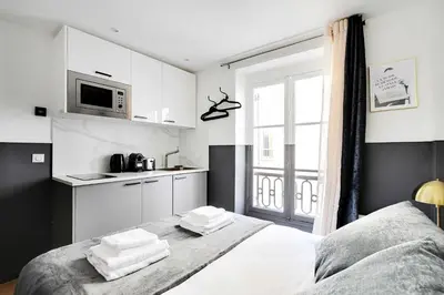 Un ou plusieurs lits dans un hébergement de l'établissement Modern Studio for 2P with A C - Near Montmartre