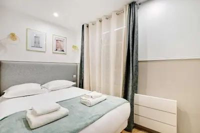 Un ou plusieurs lits dans un hébergement de l'établissement Modern flat - 1BD for 3P with AC