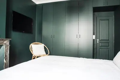 Un ou plusieurs lits dans un hébergement de l'établissement Cozy Flat, Batignolles