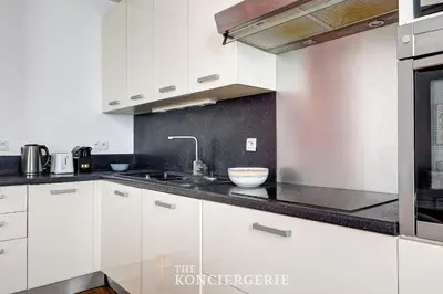 Cuisine ou kitchenette dans l'établissement Le Refuge Parisien Paris Porte d Orleans