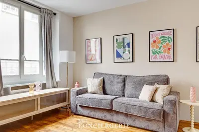Coin salon dans l'établissement Le Refuge Parisien Paris Porte d Orleans