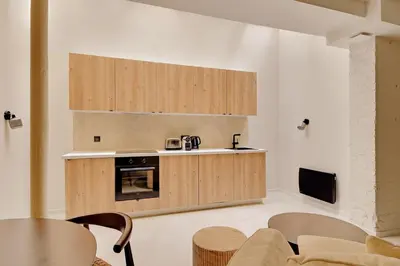 Cuisine ou kitchenette dans l'établissement Pick A Flat's Apartments in Montparnasse - Rue La Falguière